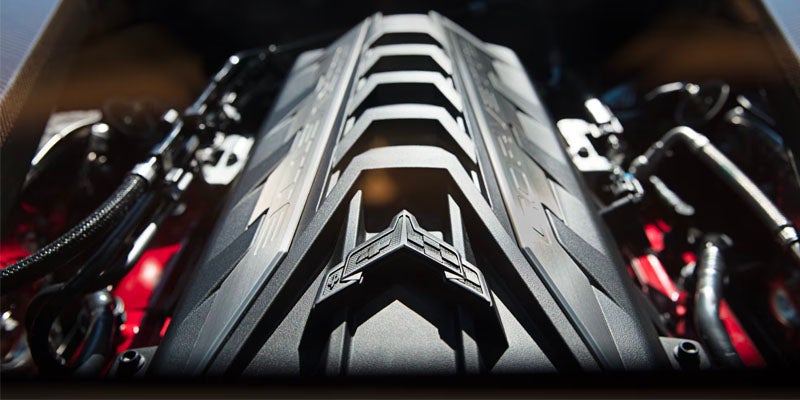 Close-up view of a car engine, showcasing its intricate components.